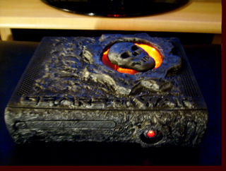Illustration for article titled Someone's Dragon Collection Melted on this Gears of War Xbox 360